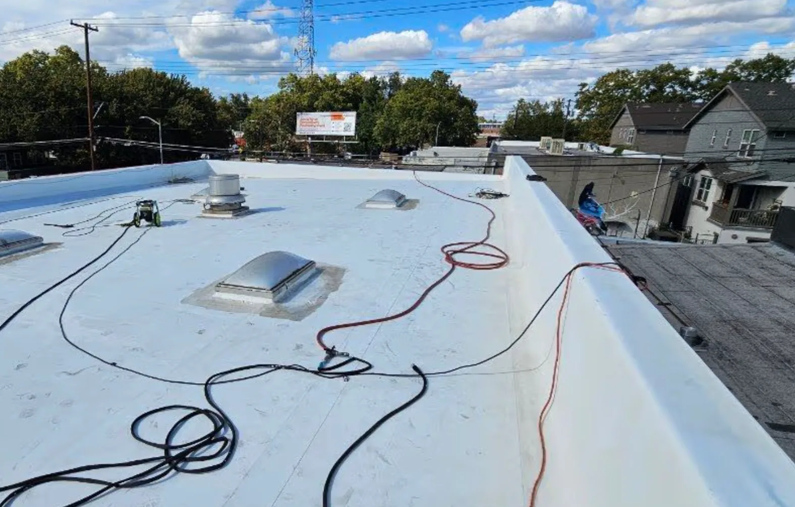 Commercial roof coating project by Higher Level Roofing