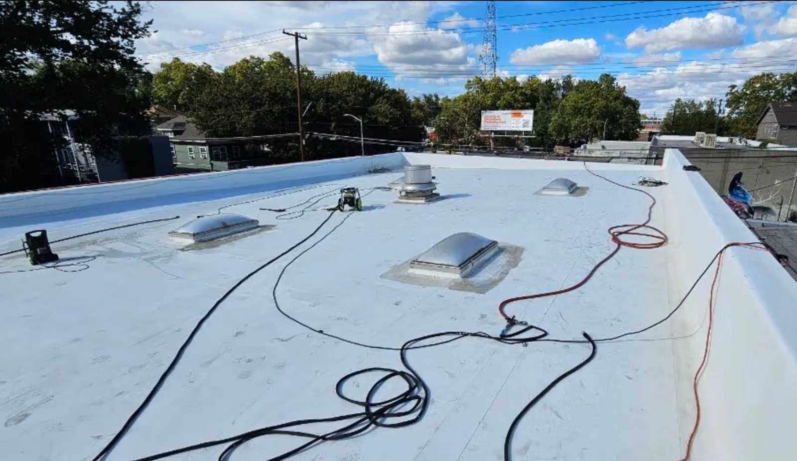 Completed commercial roof coating by Higher Level Roofing