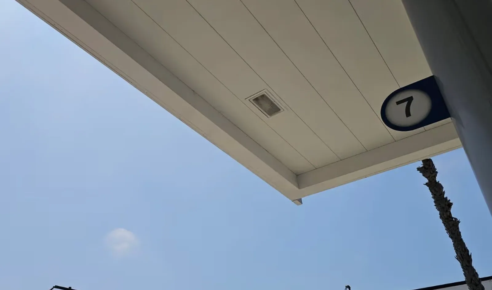 Scissor lift access for gas station canopy repair in Sacramento
