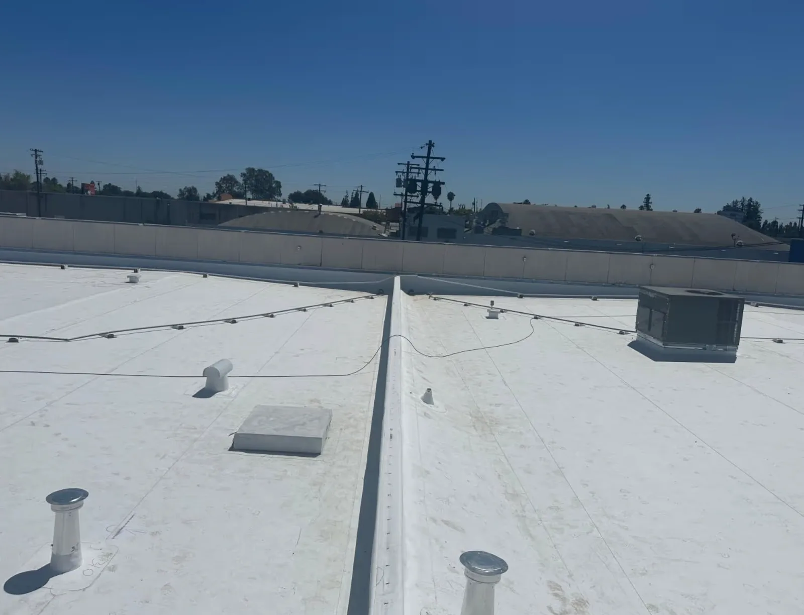 Completed tapered TPO roof system by Higher Level Roofing