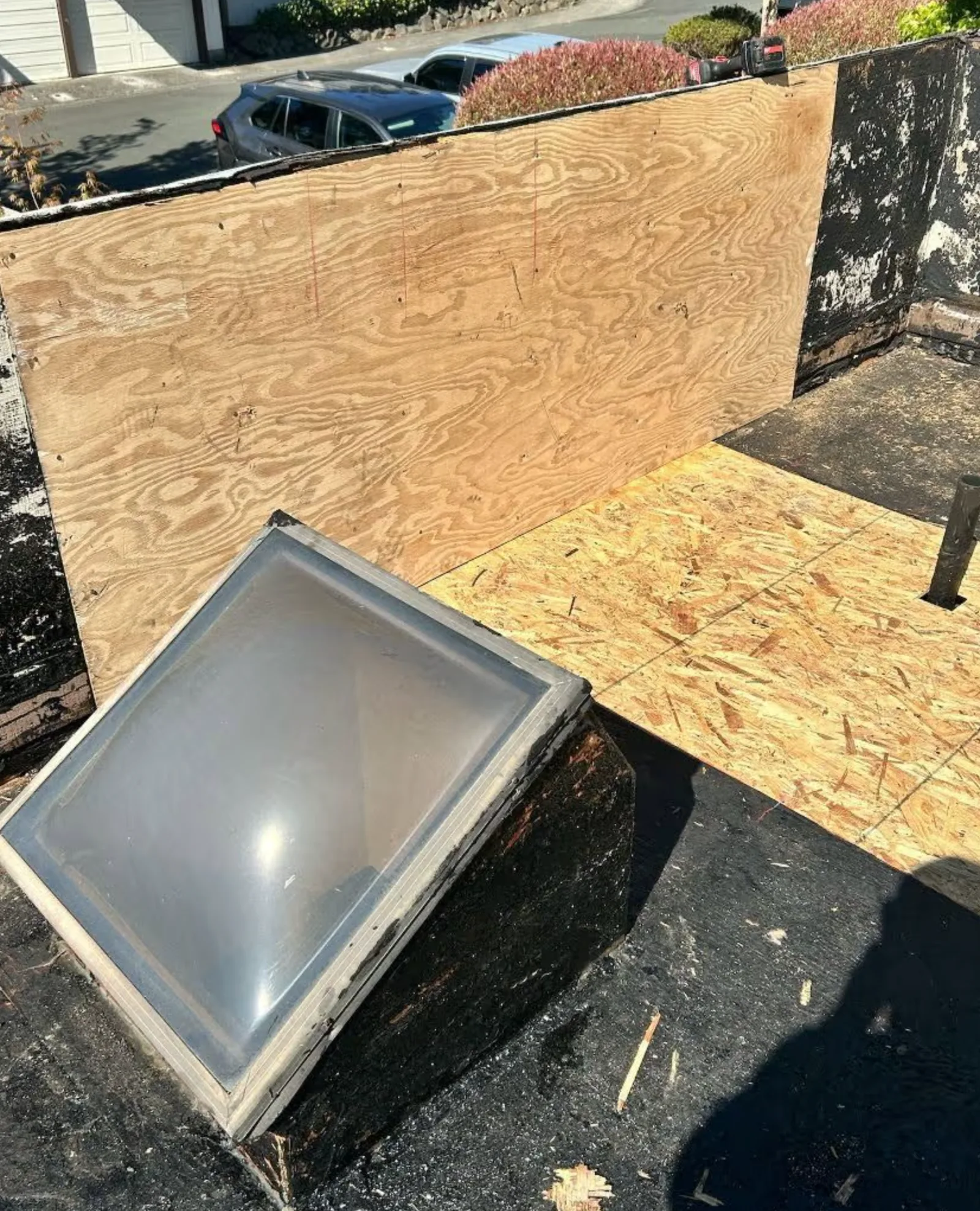 Vacaville TPO roof installation work around skylights