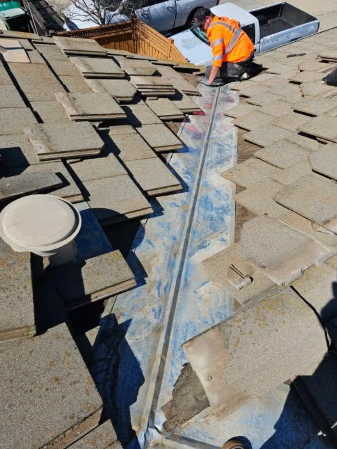 Tile roof flashing repair during a Folsom roof restoration
