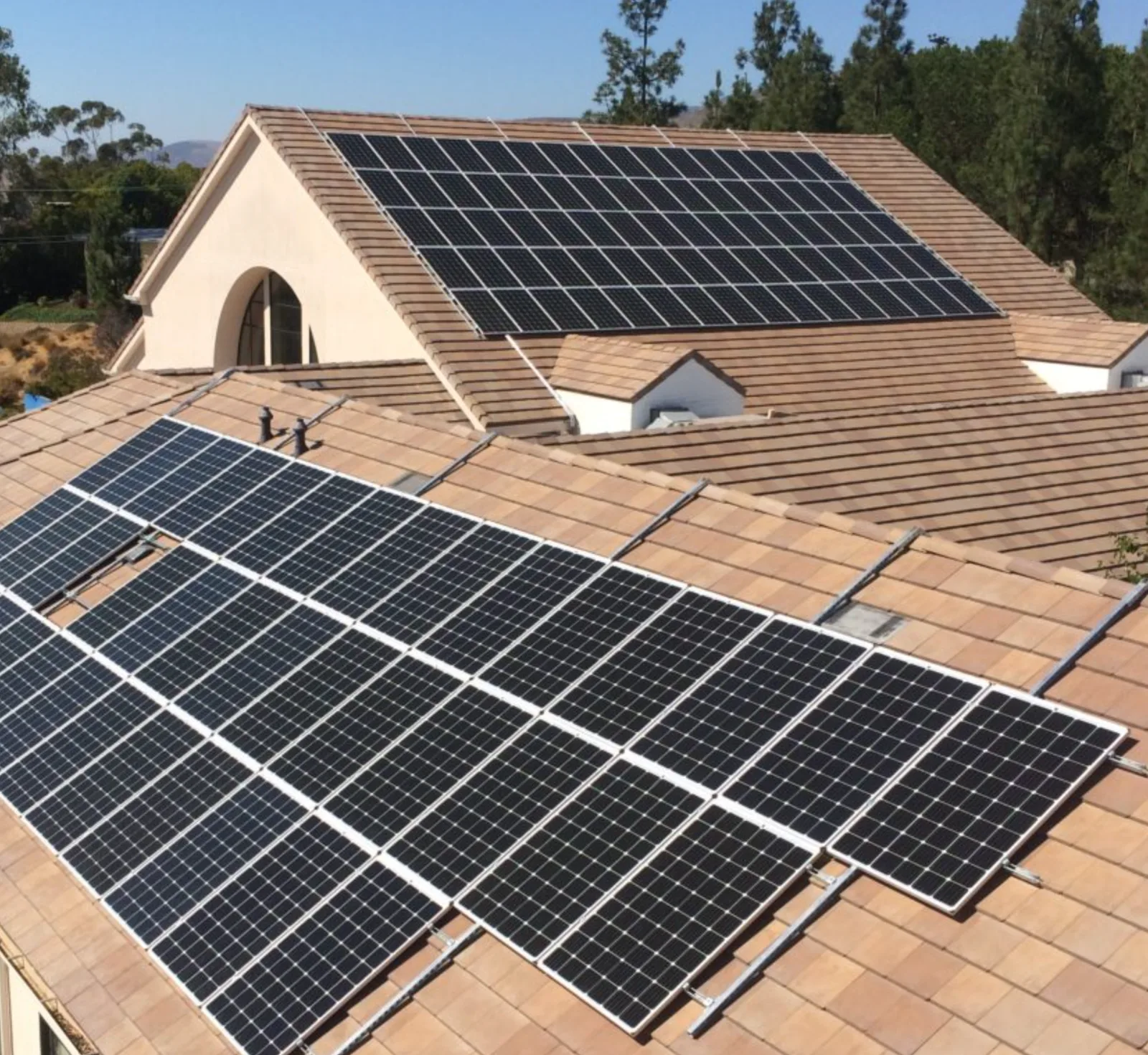 Solar installation on a roof by Higher Level Roofing
